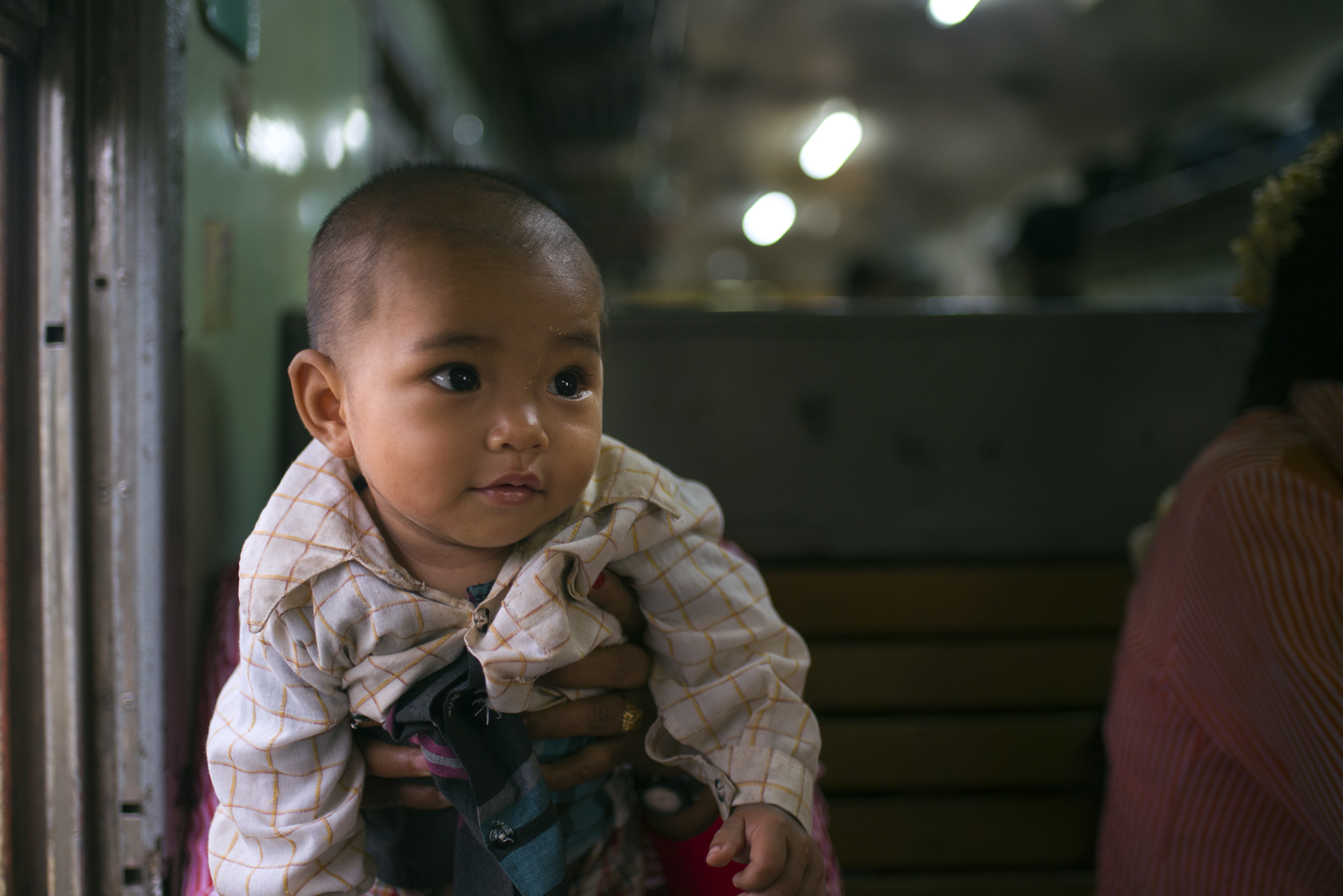 A baby and mother aboard the Mandalay express 