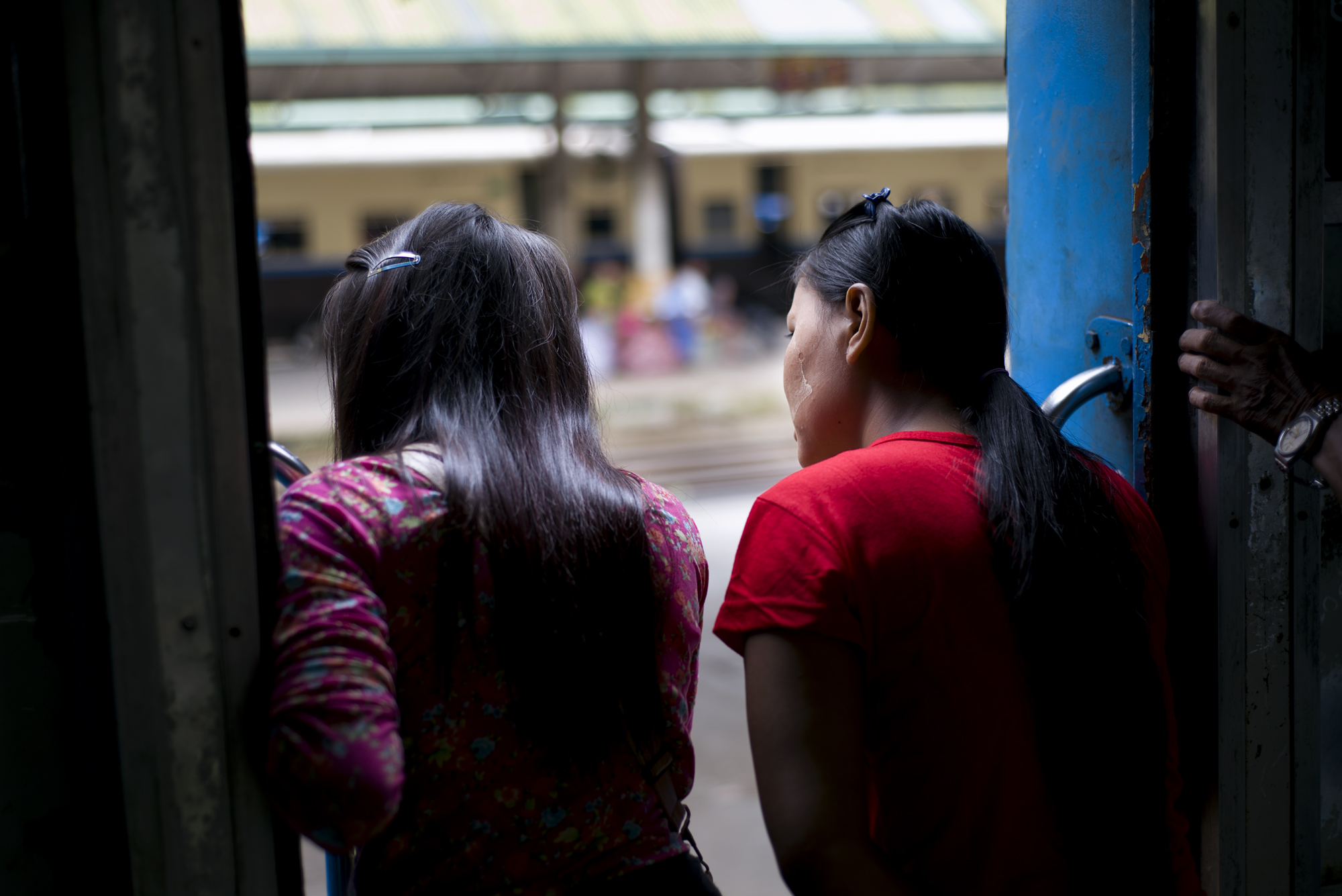 GIRLS LOOKING OUT THE DOOR.jpg