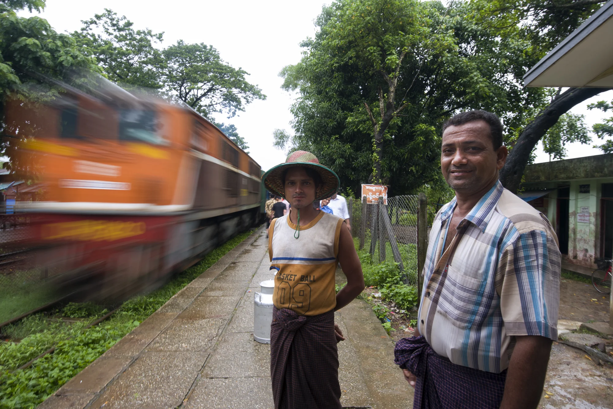 A milk salesman and his employee transport fresh mil from their farm into the city each morning using the train network 
