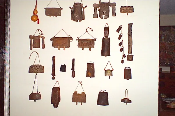 New statement wall with antique cowbells (after)
