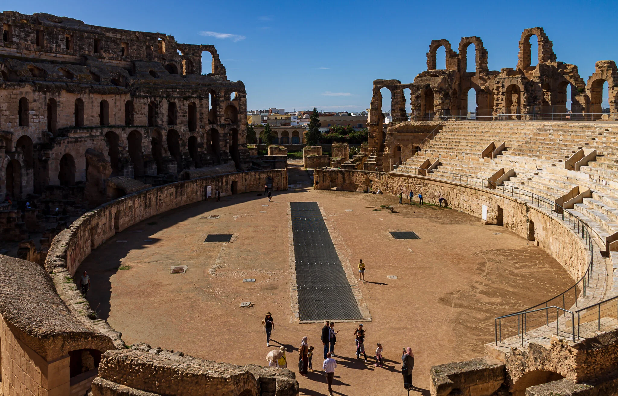  This Unesco World Heritage listed colosseum was the second-largest in the Roman world (after Rome's)  The impressive ruins of the largest colosseum in North Africa, a huge amphitheatre which could hold up to 35,000 spectators, are found in the small