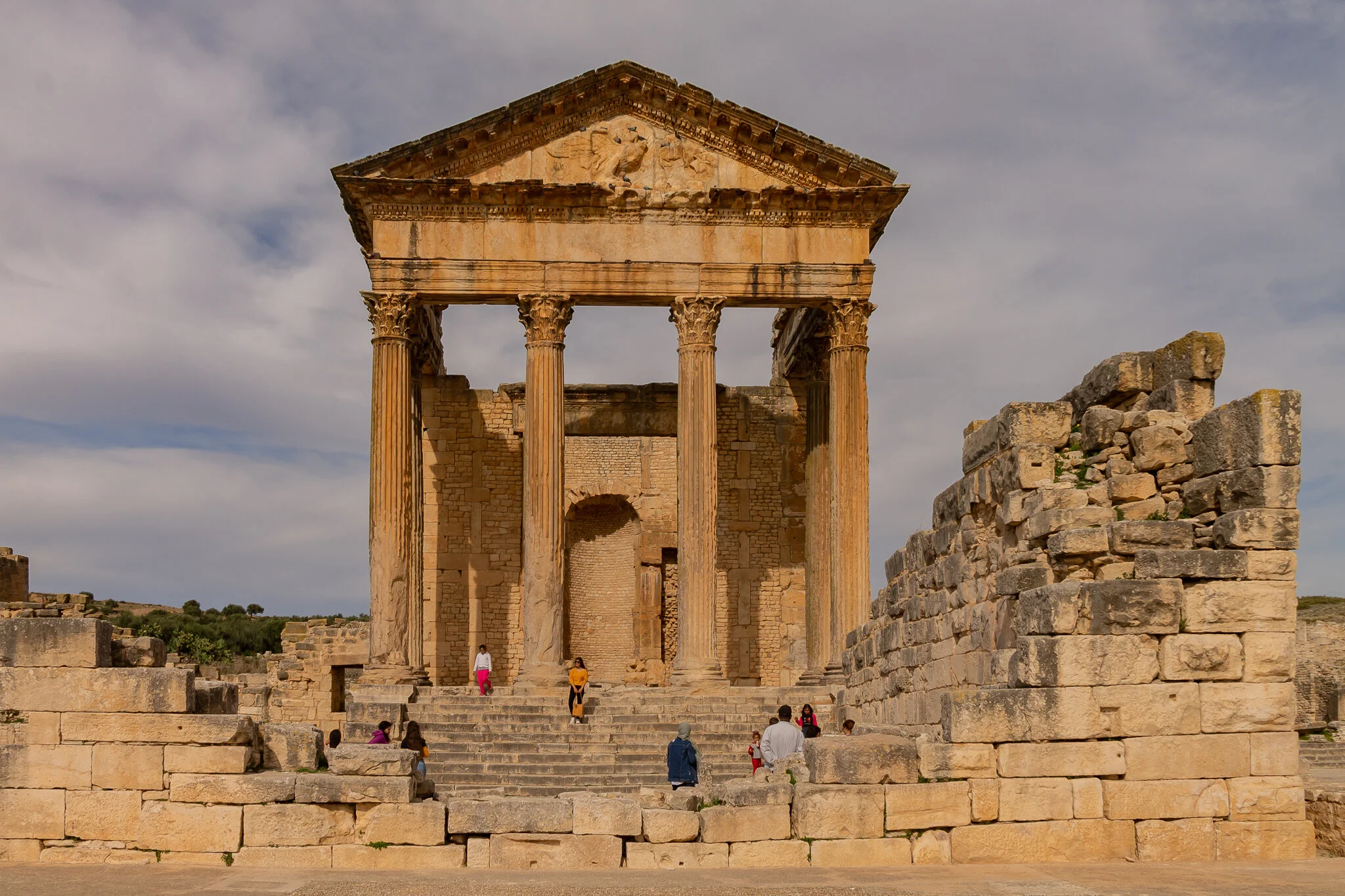  The Capitolium was built at the centre of the Forum to celebrate the concession of Roman citizenship to the inhabitants of the town. Built in 166-167 CE and dedicated to Jupiter, Juno, and Minerva (the Olympic trinity). 
