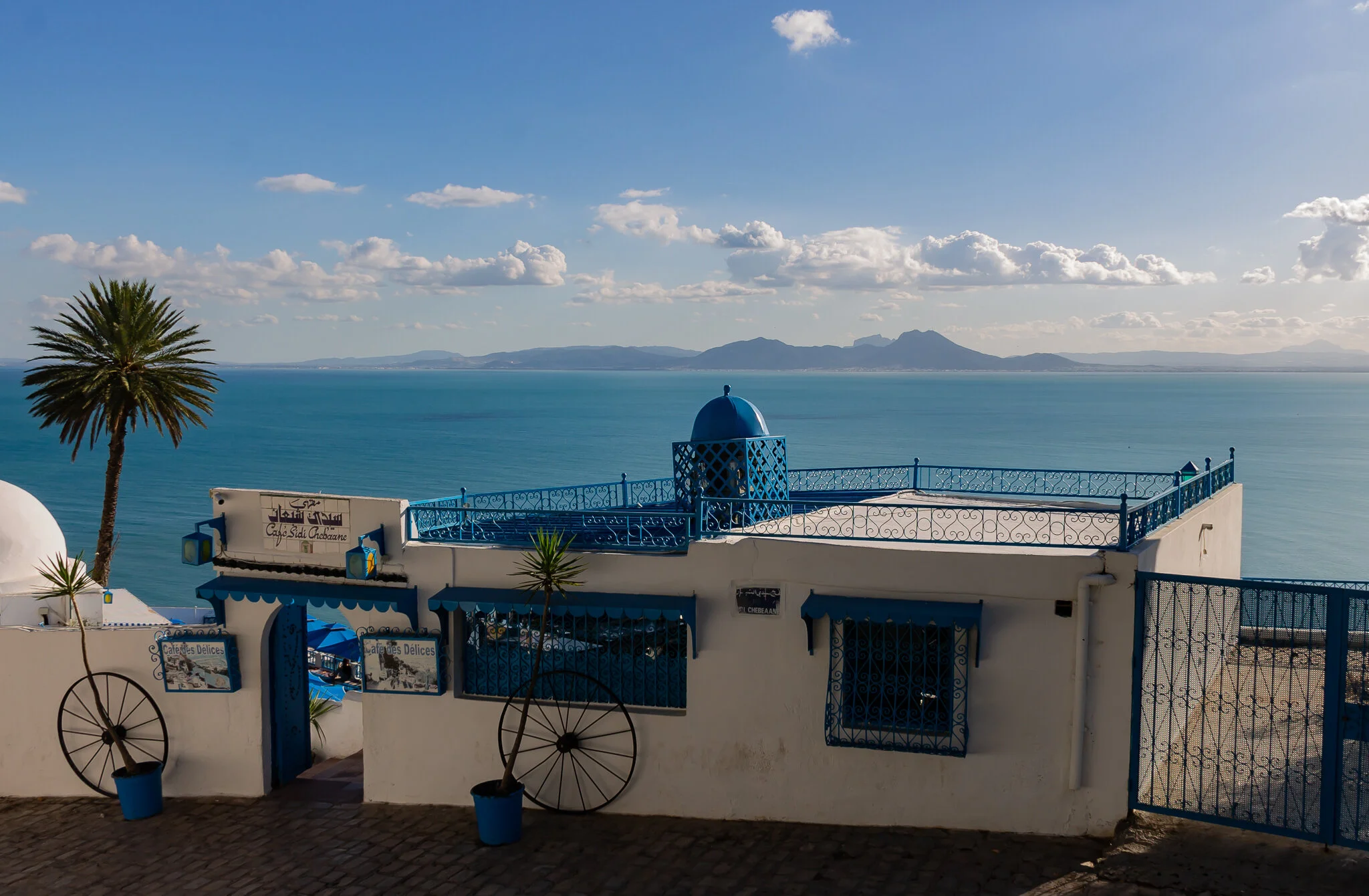  Sidi Bou Said is a town in northern Tunisia located about 20 km from the capital, Tunis. Named for a religious figure who lived there, Abu Said al-Baji. The town itself is a tourist attraction and is known for its extensive use of blue and white. 