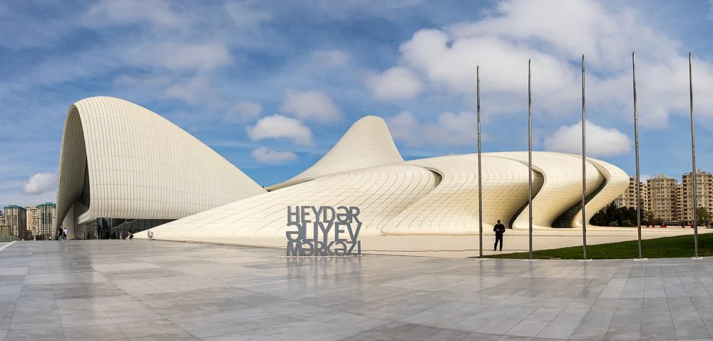   Heydar Aliyev Center   Zaha Hadid didn't do straight lines, and the Heydar Aliyev Center makes no apologies for that. No sharp angles, no columns, just a flowing white form that compelled me to circle it with my camera looking for every angle. 