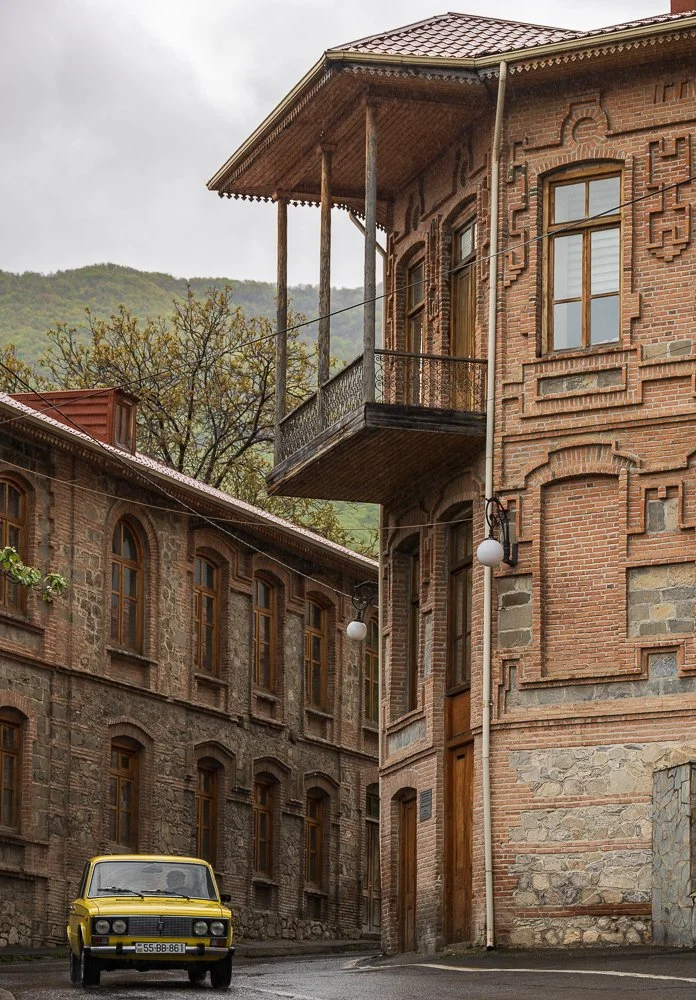   Sheki   The city is 2,700 years old, tucked into the forested foothills of the Greater Caucasus, built on a long history of Silk Road trade, silkworm breeding, and raw silk. The historic centre is a UNESCO World Heritage Site. I ate piti, the natio