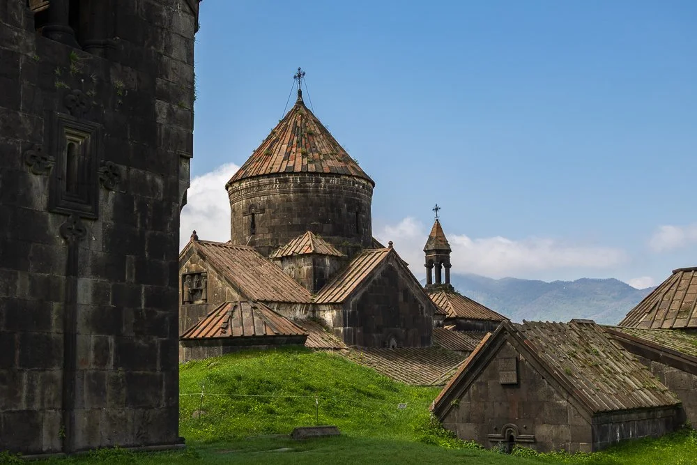  At its peak  Haghpat Monastery  housed over 500 monks with a famous library and schools of grammar, philosophy, theology, music, and medicine. It was the exterior I couldn't stop photographing: the defensive walls, the bell tower, the stone roofs. I