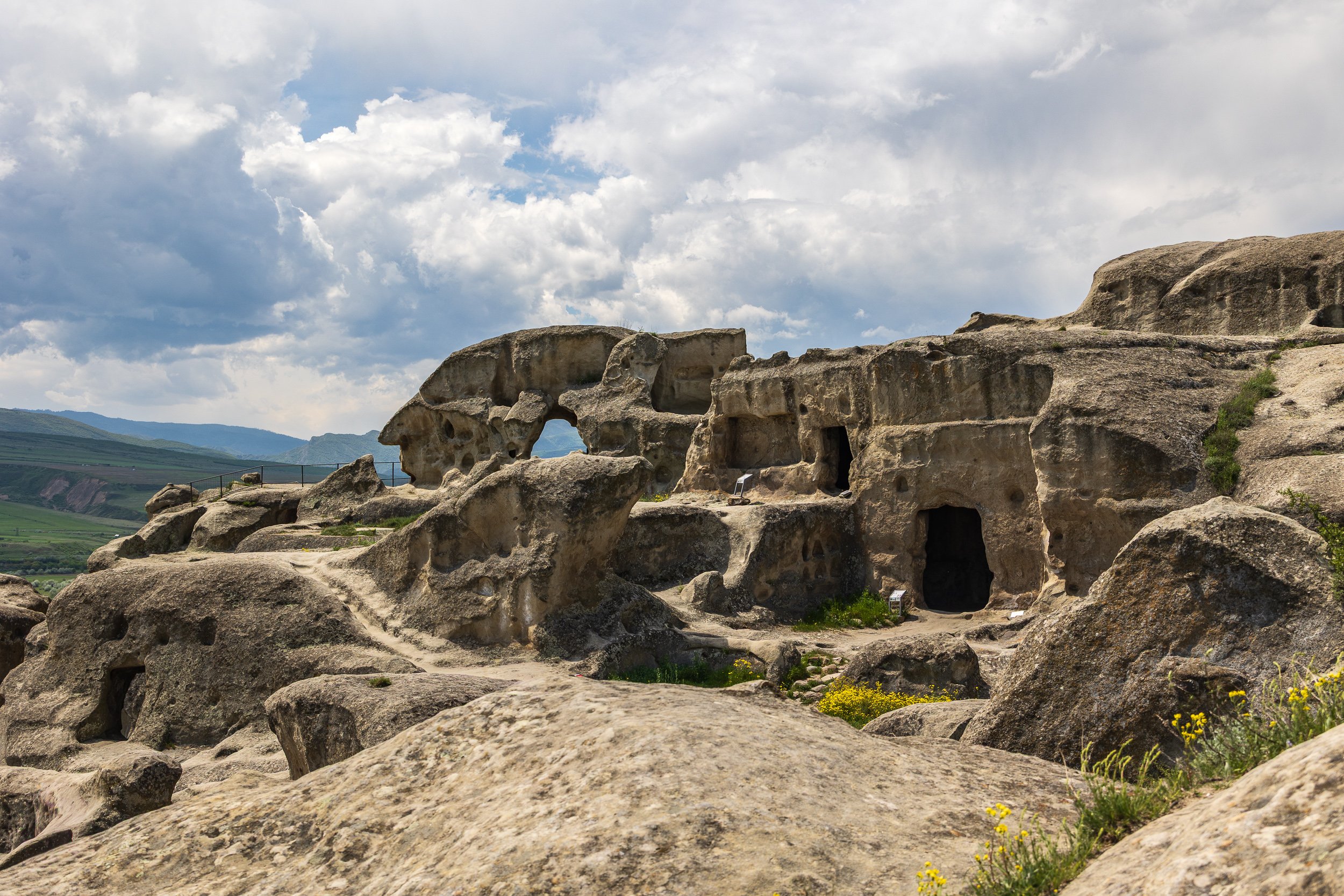  150 remaining caves out of a larger complex spanning 8 hectares. Notable remnants include ancient wine cellars (marani), a Hellenistic-style amphitheater, pharmacies, prisons, and the Hall of Queen Tamar 