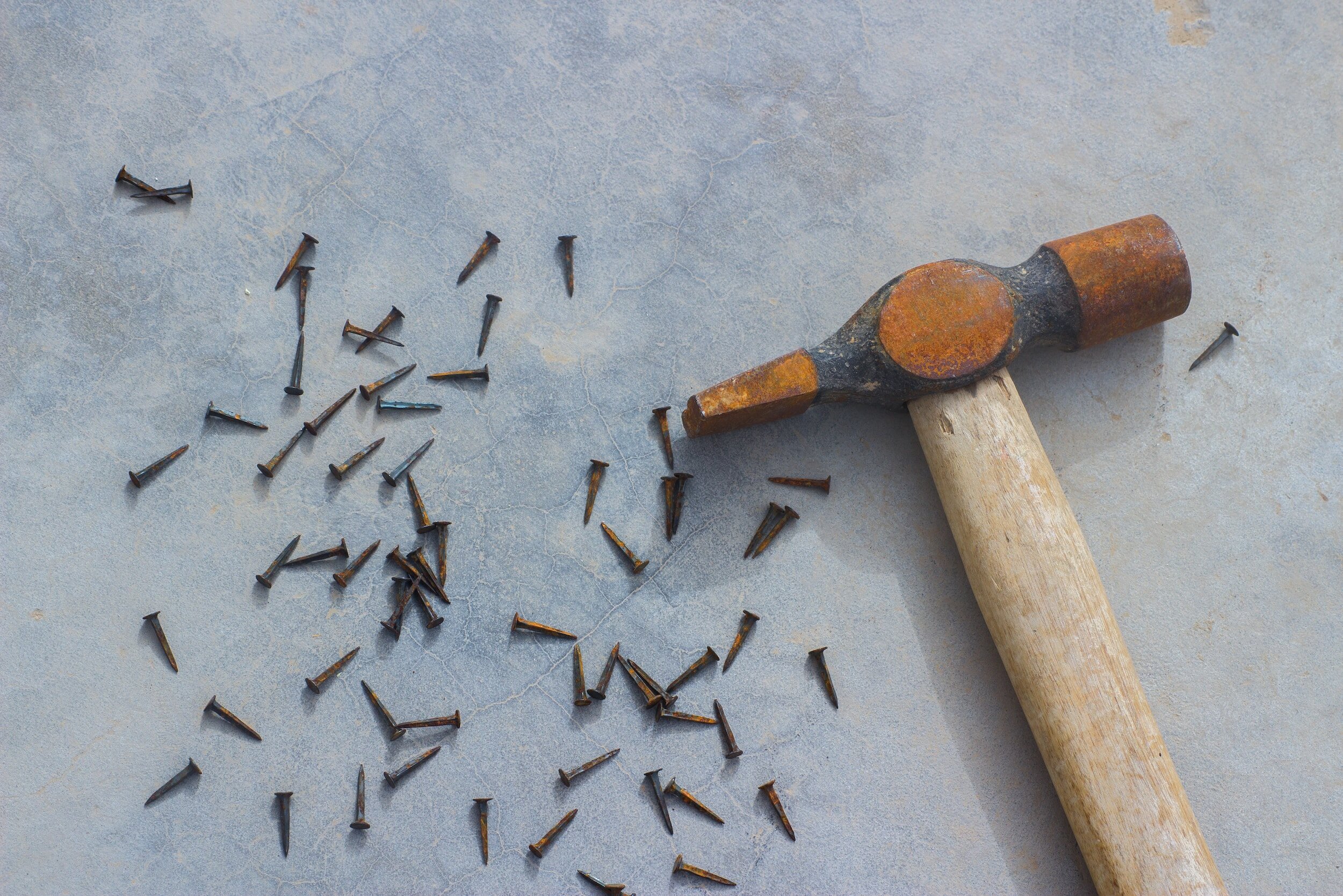 The Hammer And The Rusting Nail - The Hammer And The Rusting Nail Poem by  ANDREW BLAKEMORE