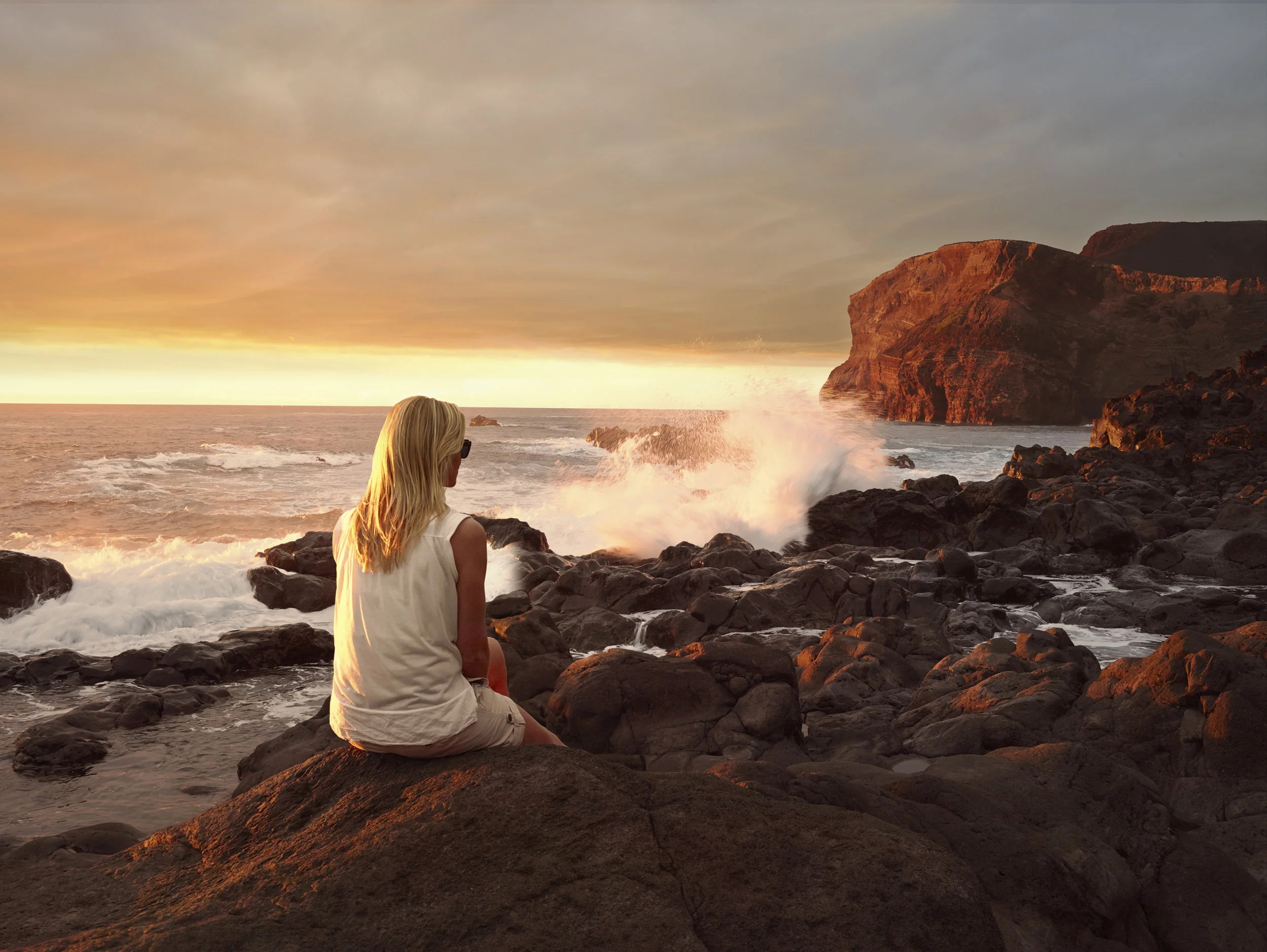 GIRL ON THE ROCKS