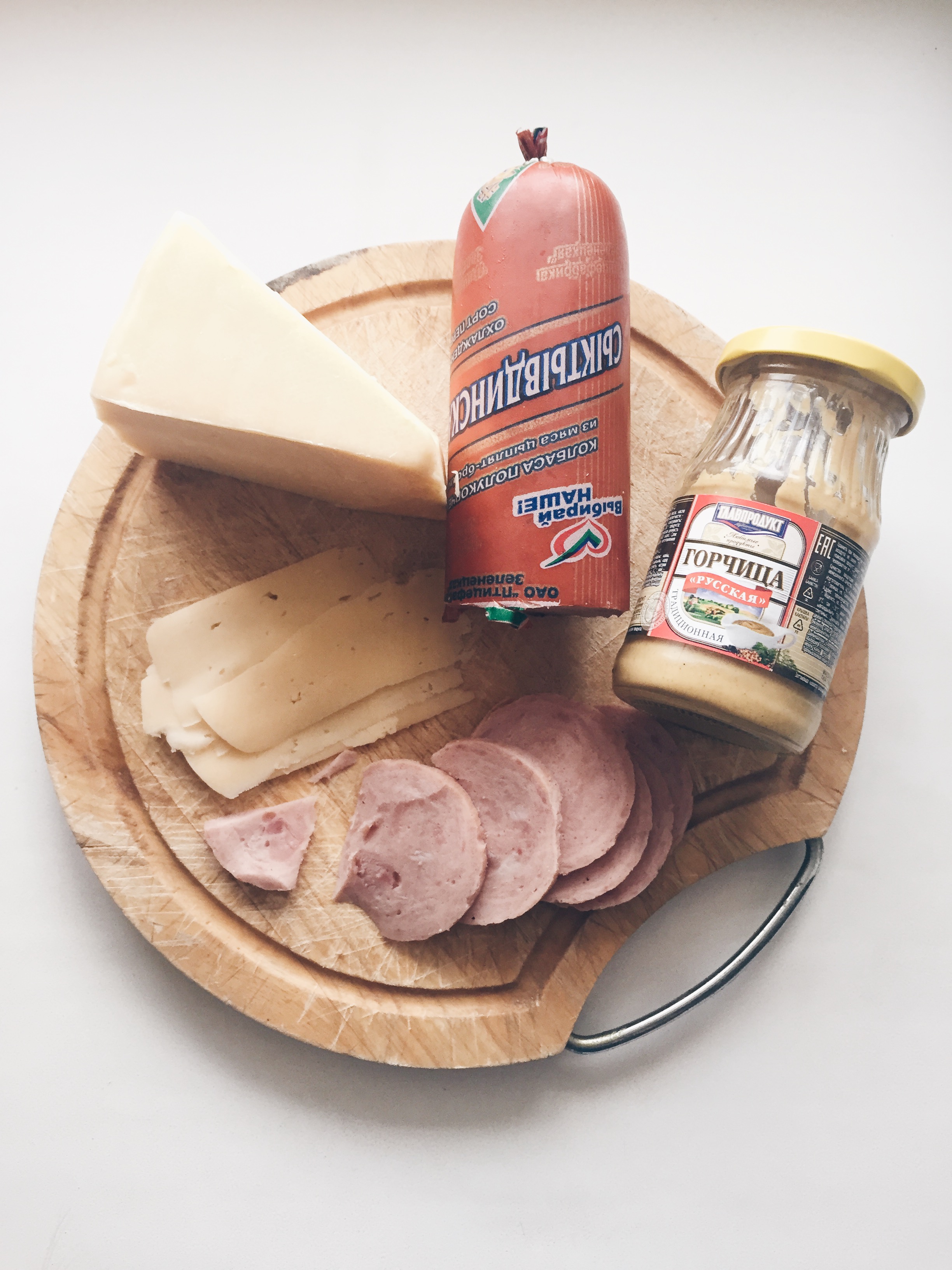 Cheese, chicken sausage, and spicy mustard.