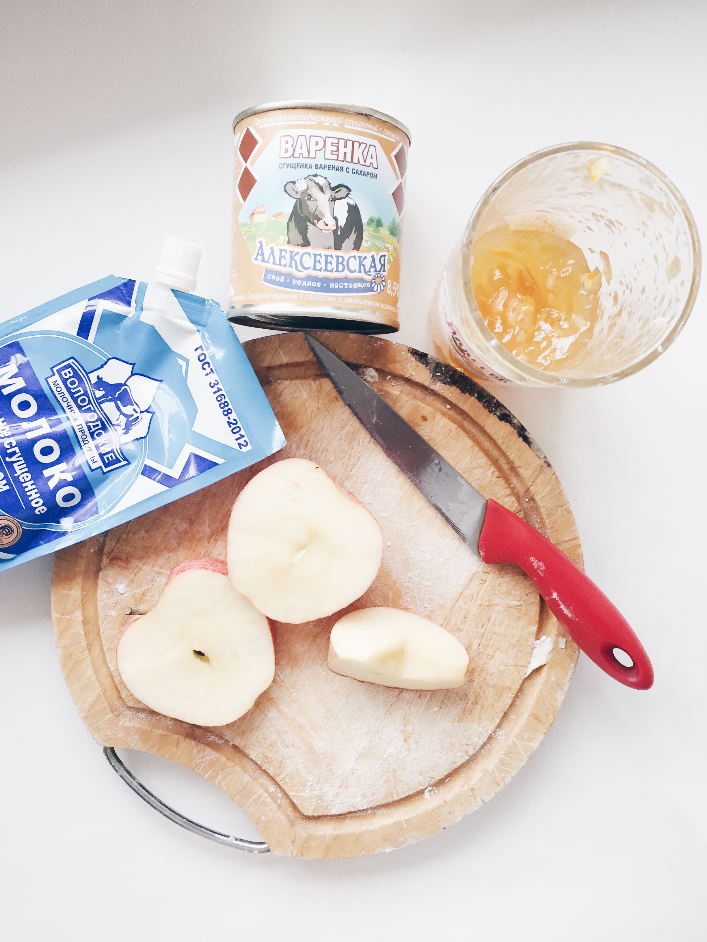 Clockwise from left: Sguschenka, boiled condensed milk, orange marmalade, apple.