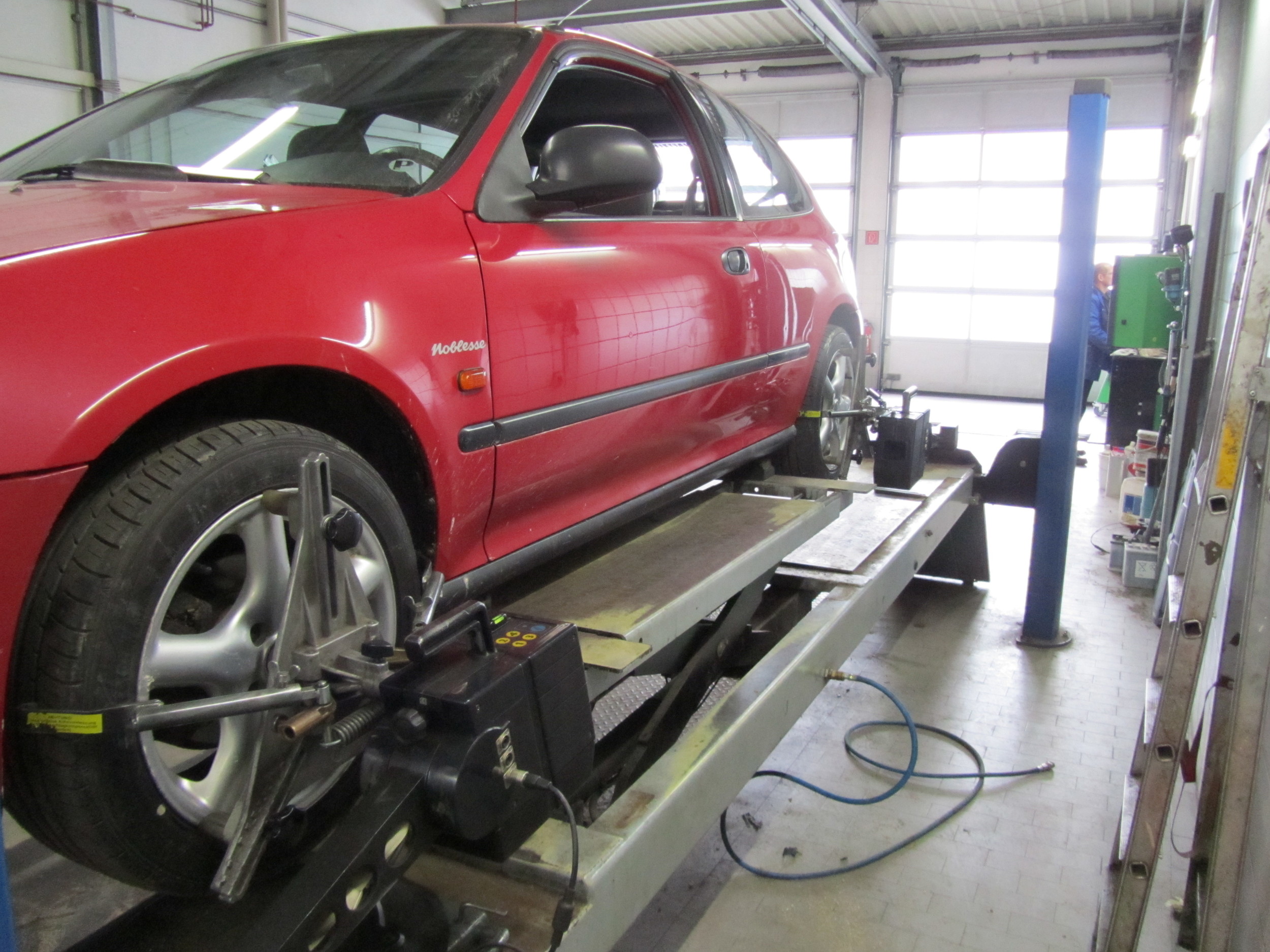 6. To finish the day at the garage, the alignment needed to be done using a pretty cool laser driven system.
