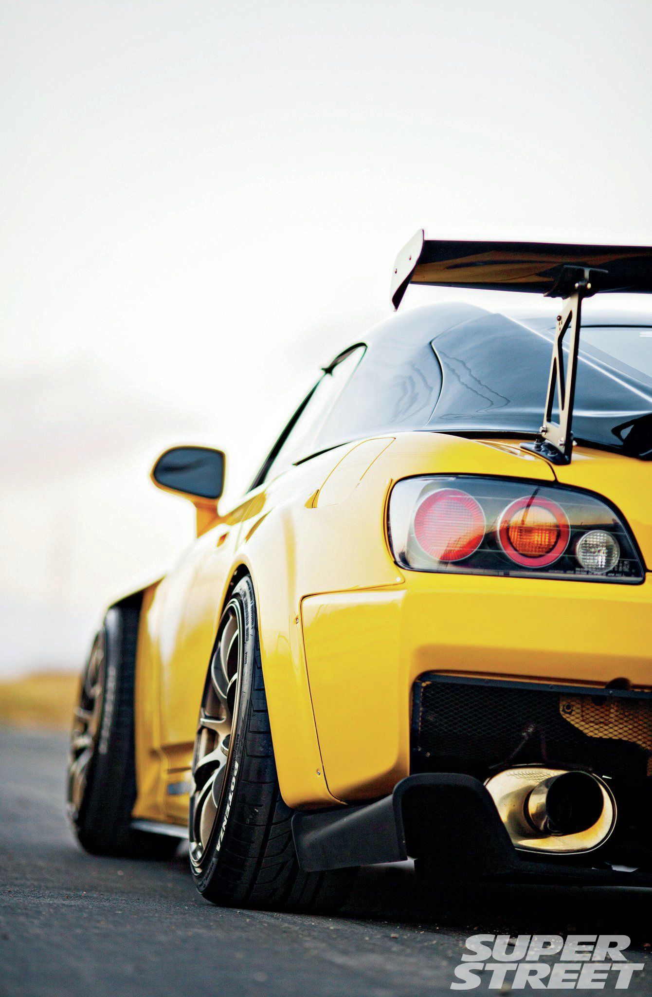 2002-honda-s2000-spoon-sports-s-tai-rear-over-fender-02.jpg