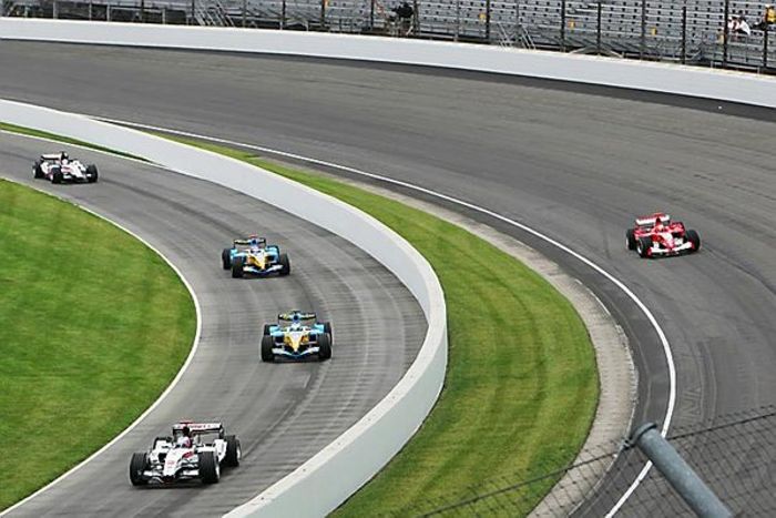 Both of the car pulling into the pits after the formation lap at Indy