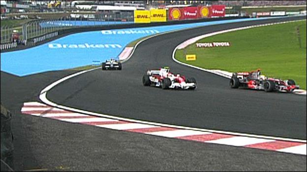 Hamilton passing Glock at the last corner of the last lap of the last race of the season to claim his first ever World Championship
