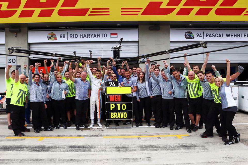 Wehrlein and the Manor team celebrating after clinching their first point in 2 years.