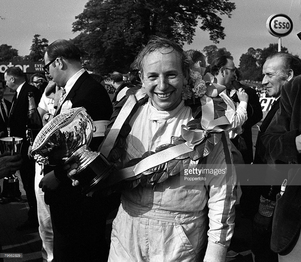 John Surtees filled with pride after winning the Gold Cup in his own car, Outon Park 1970.
