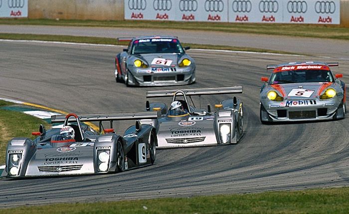 Andy Wallace and Wayne Taylor trailing each other on their way to a decent finish, Petit Le Mans 2000.