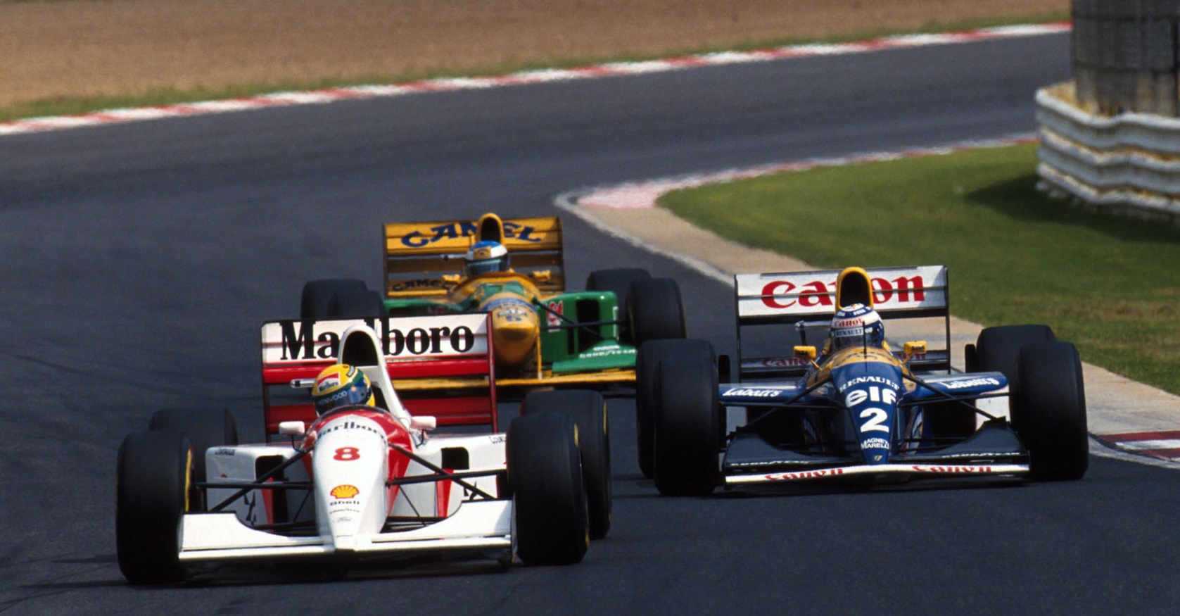 Senna fighting Prost and Schumacher for the lead, Kyalami 1993.