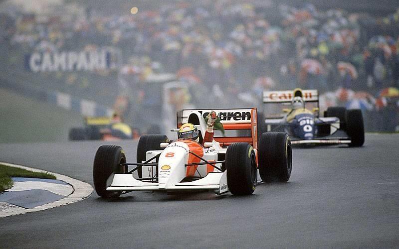 Ayrton Senna celebrating his unprecedented win, Donington Park 1993.