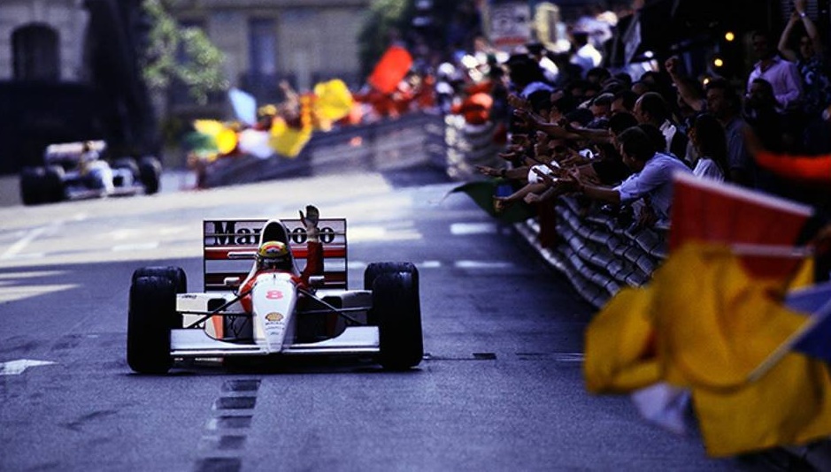 Ayrton Senna celebrating his 6th and final Monaco Grand Prix victory.