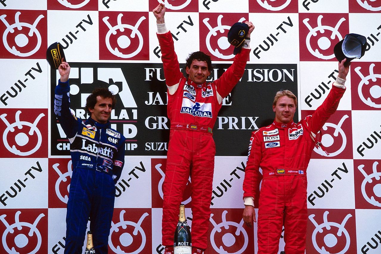 Alain Prost, Ayrton Senna and Mika Häkkinen on the podium, Suzuka 1993.