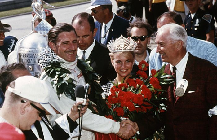 Graham Hill enjoying the festivities on victory lane, Indianapolis 1966.