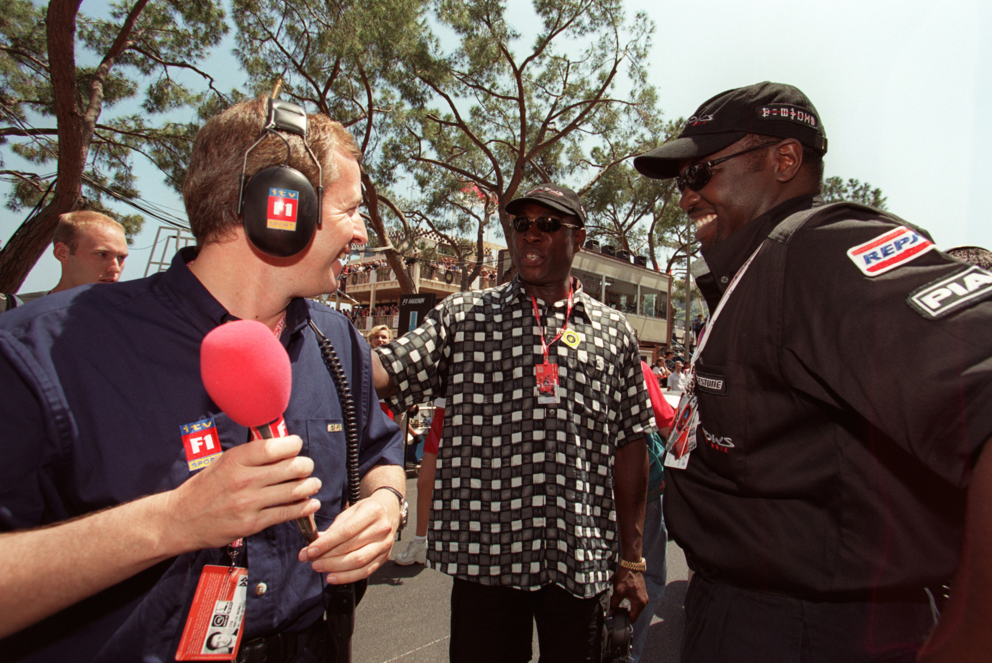 Prince Malik Ado Ibrahim (right) with ITV F1-reporter Martin Brundle and boxing legend Frank Bruno (center).