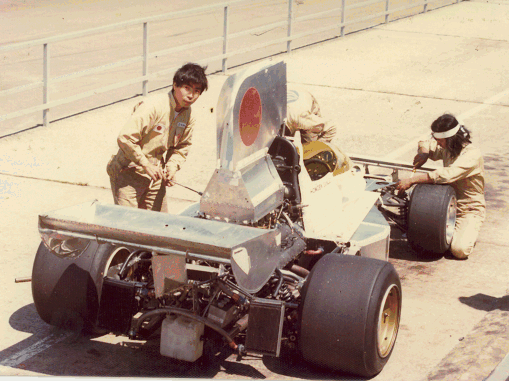 Maki mechanics working on the industrial-looking F101 chassis.
