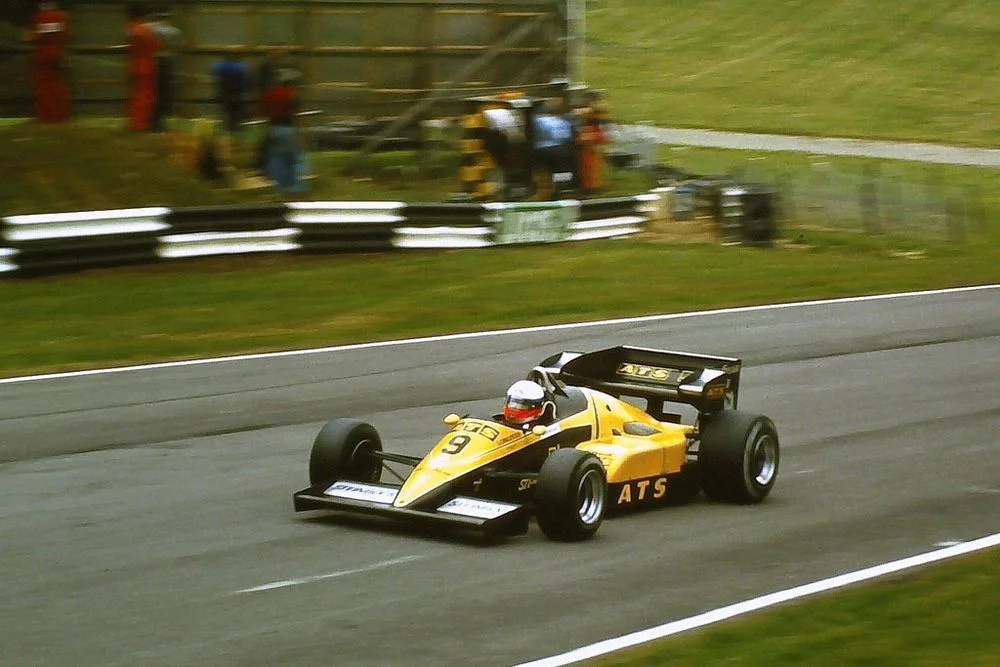 Manfred Winkelhock on run up to Druids, Brands Hatch 1983.