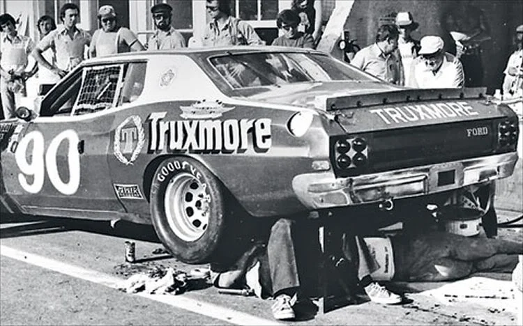 The Donlavey crew taking a look at the overheating differential, Le Mans 1976.