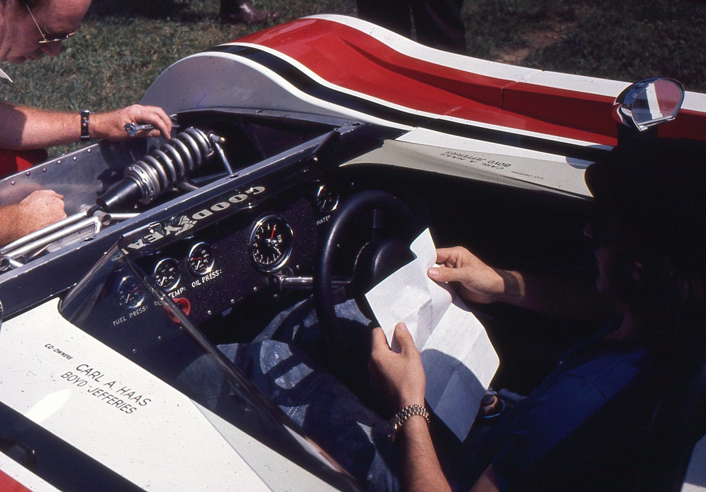 Jackie Stewart in his office. Another added safety feature was soft padding on his steering wheel.