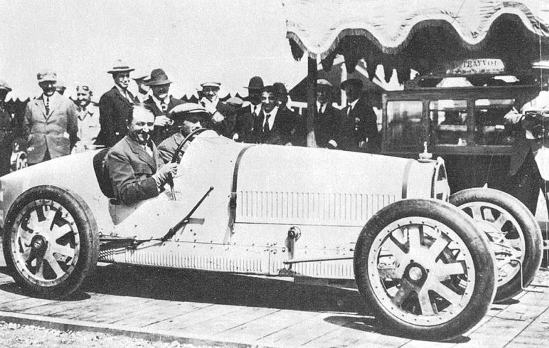 Ettore Bugatti at the wheel of what would become his most successful racing car, the 1924 Type 35.