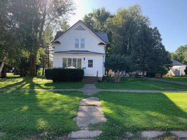 Nice large older home near the park in Battle Creek. Large family room addition to the home, attached garage and very large bedrooms. Second detached garage, car port and oversized lot and its location near the park make it very family friendly. There was a new steel roof put on in July of 2019 and the basement has been completely cleaned and repainted. Lovely wood trim and hardwoods. This is a must see.
