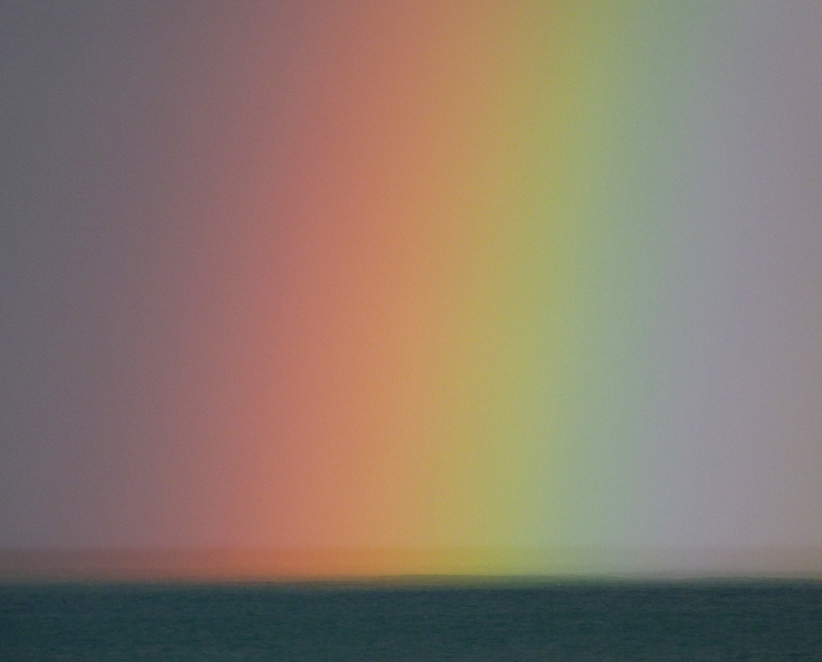 The end of the rainbow during a storm, off Rousse.