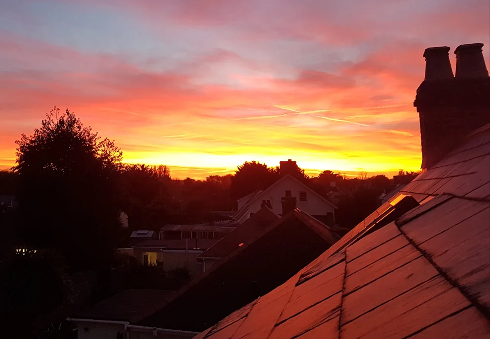 A late-October sunset from our house roof.