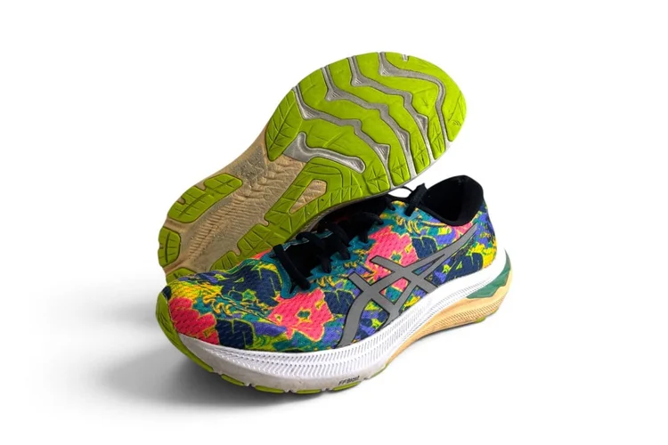 ASICS running shoes with worn outer soles, before resoling