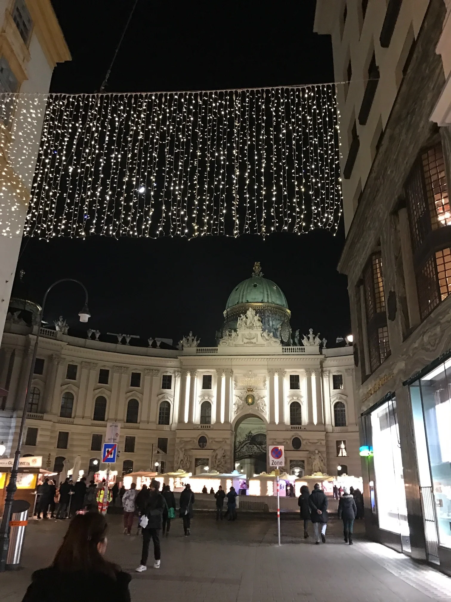 Entering the Hofburg Palace with a Christmas Market in front. It is worth noting that there are Roman ruins on this side of the Market... Yes, Vienna is filled with history!