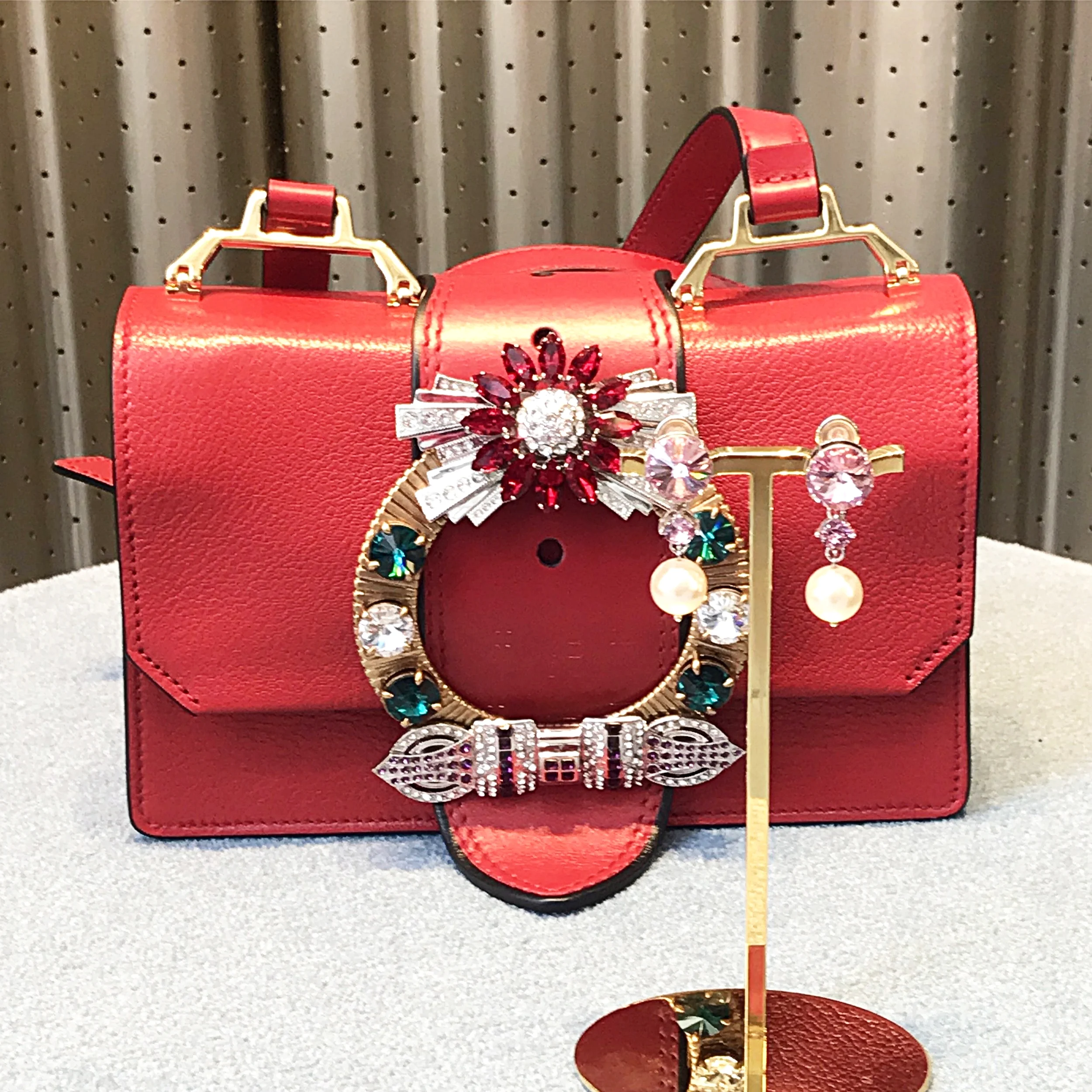 Again, Miu Miu... and now with coordinating earrings!