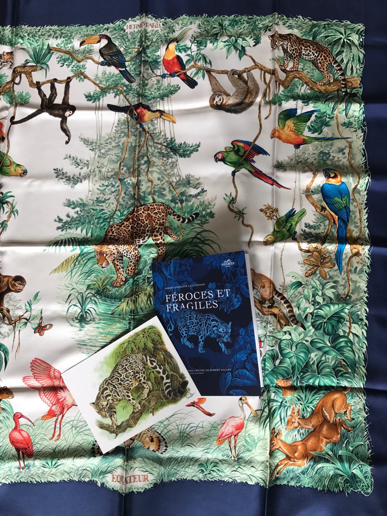 My treasured "Equateur"&nbsp;scarf,&nbsp;featuring the leopard in the centre and other fauna illustrations from Equator. The wild cat illustrations and artwork make up the exhibit, "Féroces et Fragiles", the Fierce and Fragile.