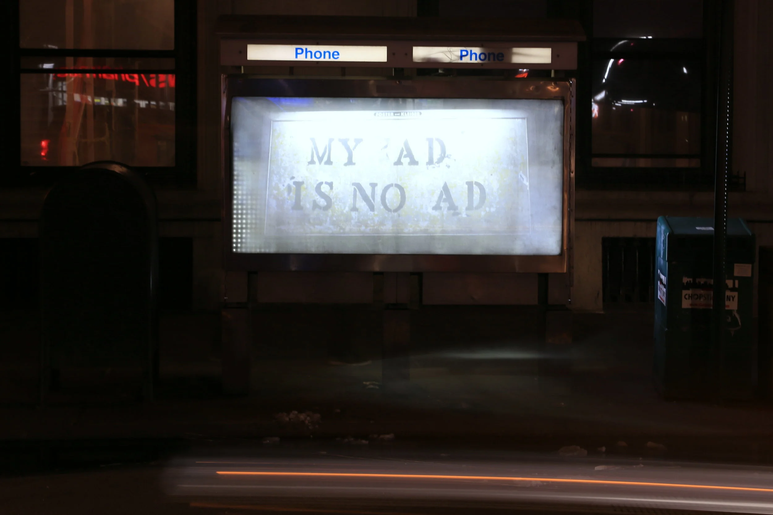 My Ad is No Ad by John Fekner. Photo by Luna Park. Night shot.