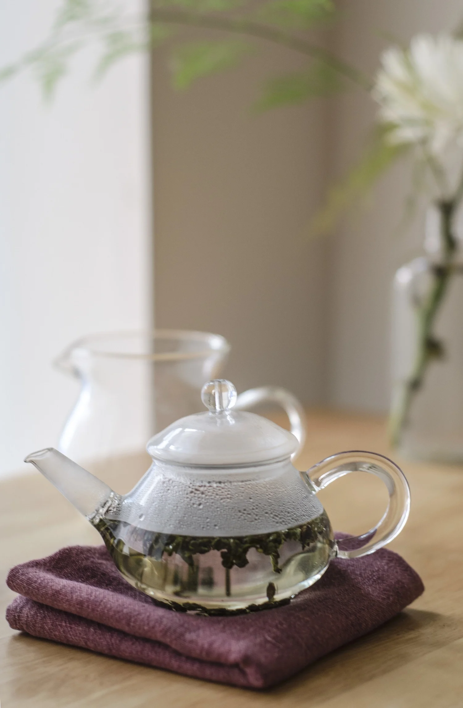 small glass teapot tea brewing