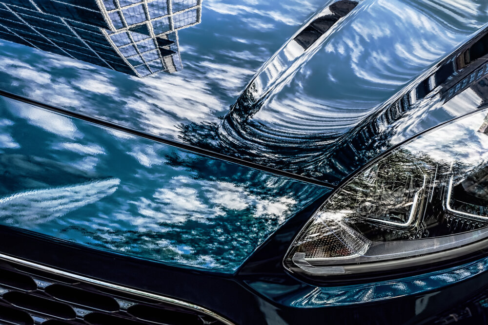 06 06 reflections car hood sky.jpg