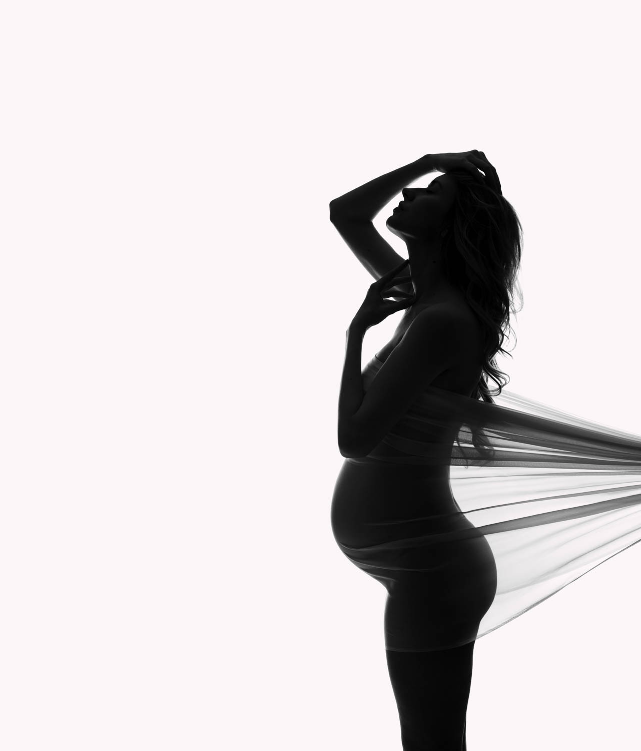 Lola Melani empowers pregnant women by creating beautiful maternity photography in NYC