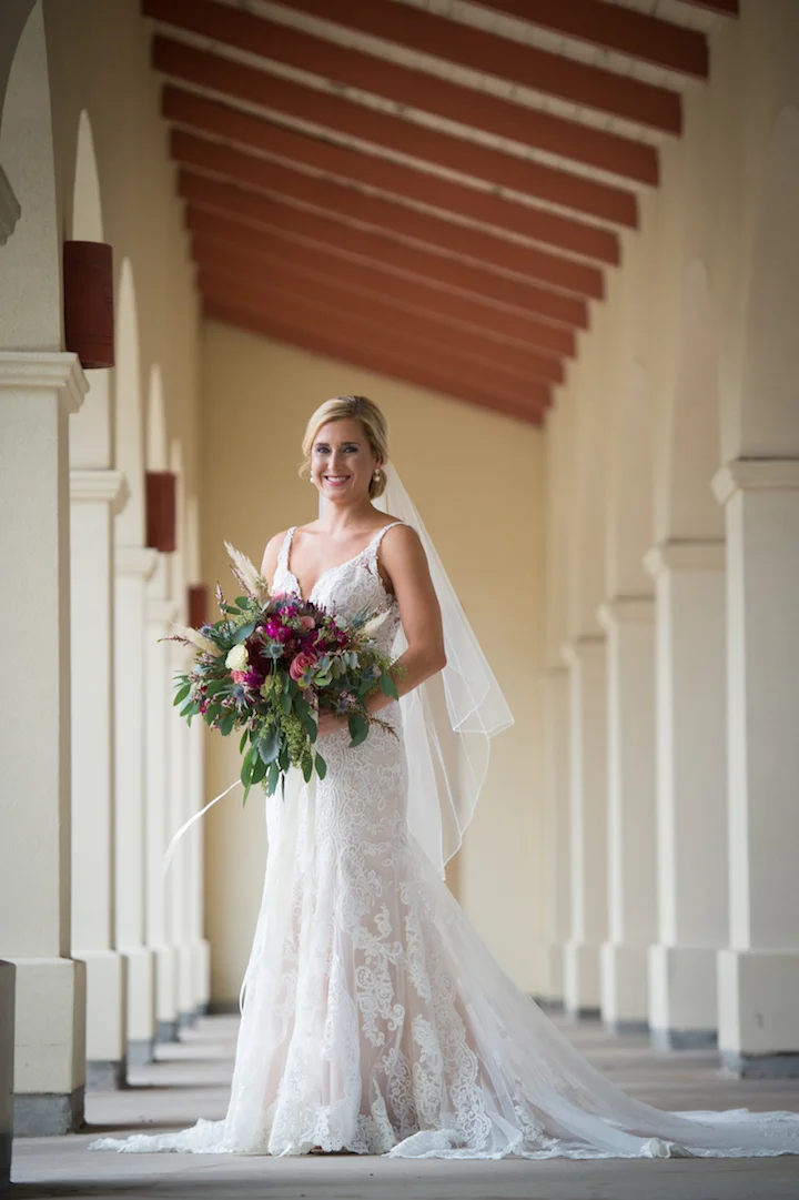 Vibrant Florals and architecture bridal photo www.avenueievents.com.jpg
