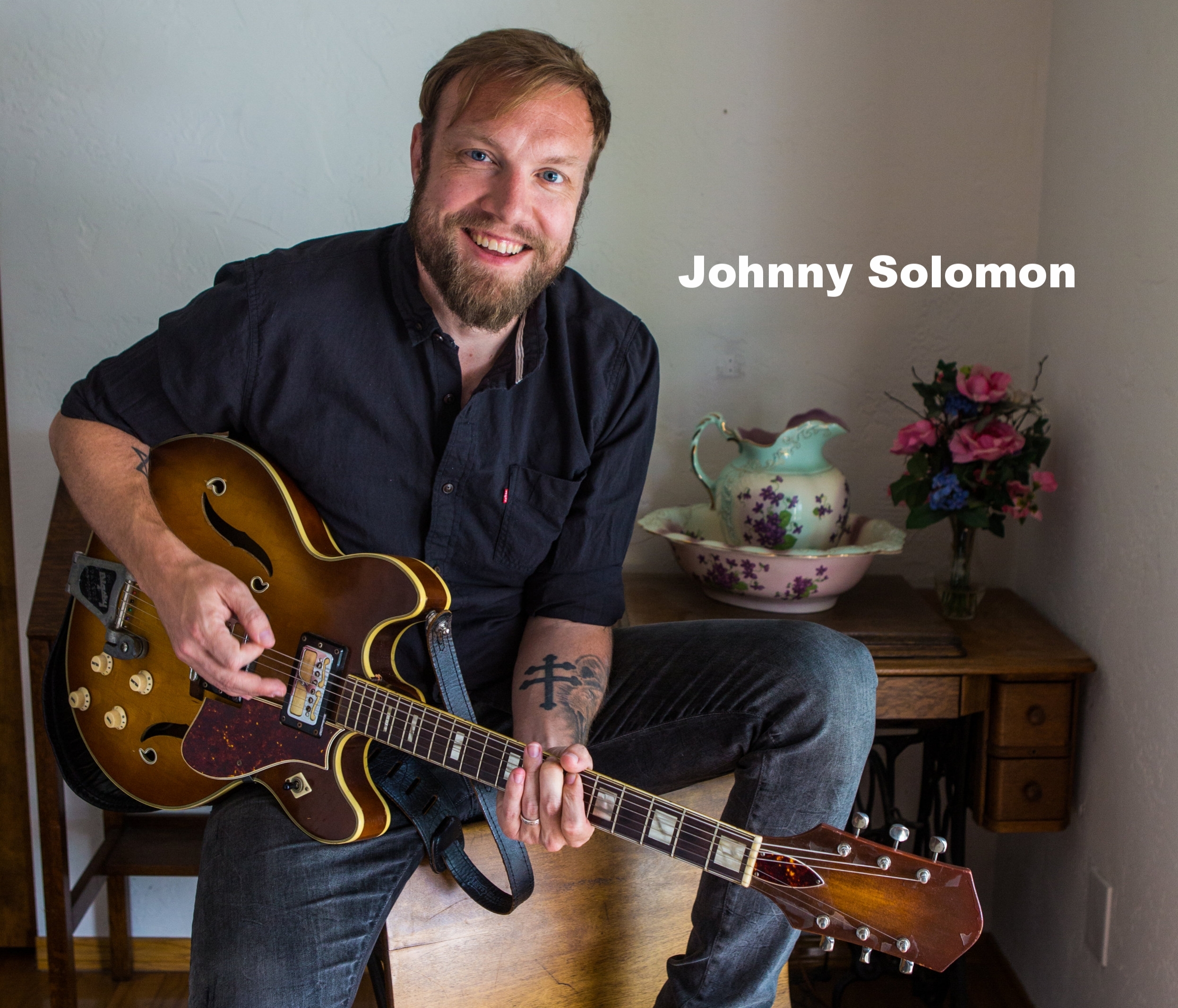 JOHNNY WITH GUITAR_HIGH-RES.jpg