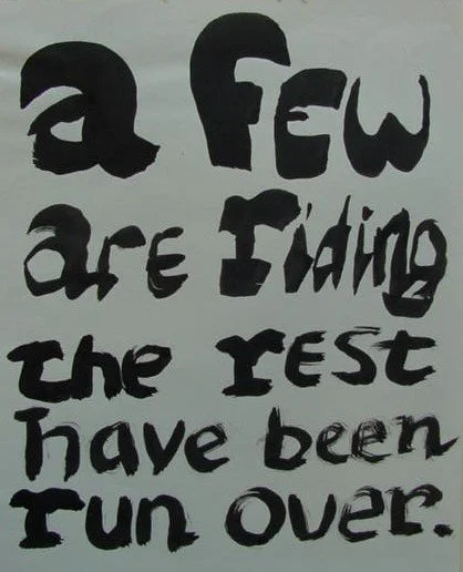 a ink drawing that says "a few are riding, the rest have been run over"