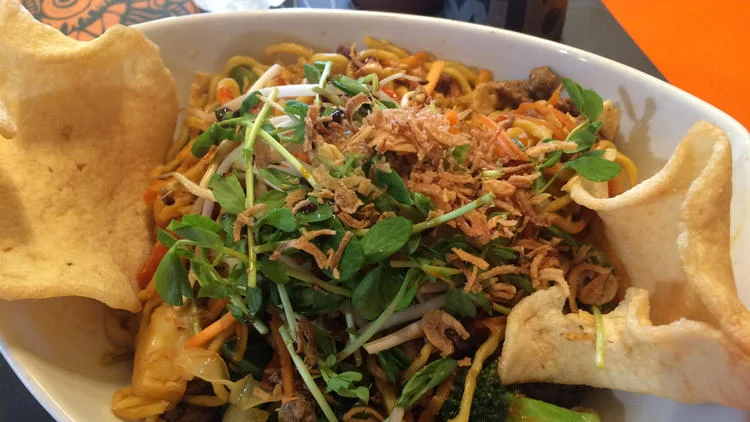 Krakatoa Indonesian cuisine will soon bring its tasty Asian dishes, such as spicy lamb noodles (pictured), to downtown Hollywood. (Mike Mayo / SouthFlorida.com)