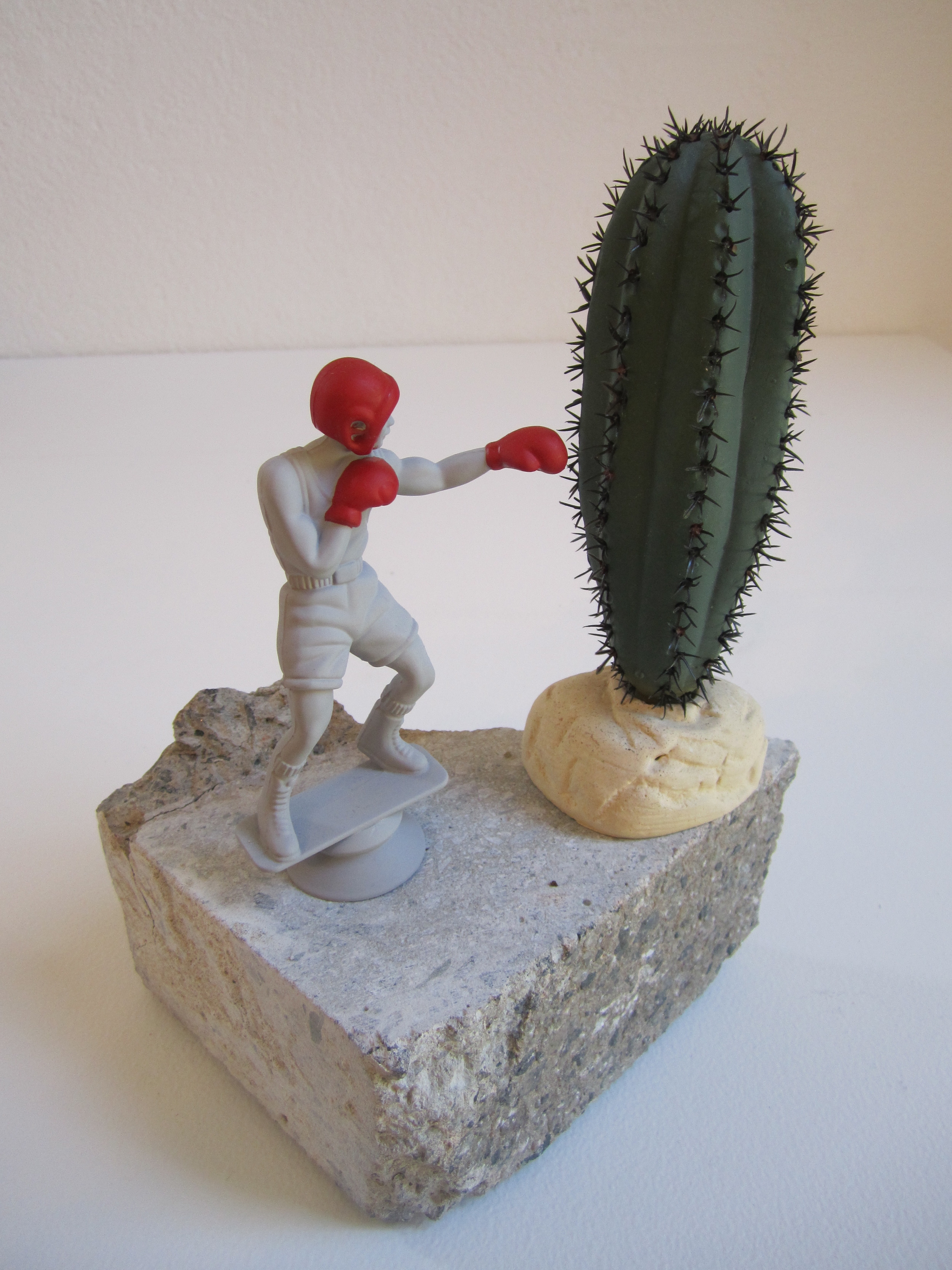   Sharp Jab, 2011    Enamel on acrylic, concrete, plastic 21 x 24 x 14 cm   