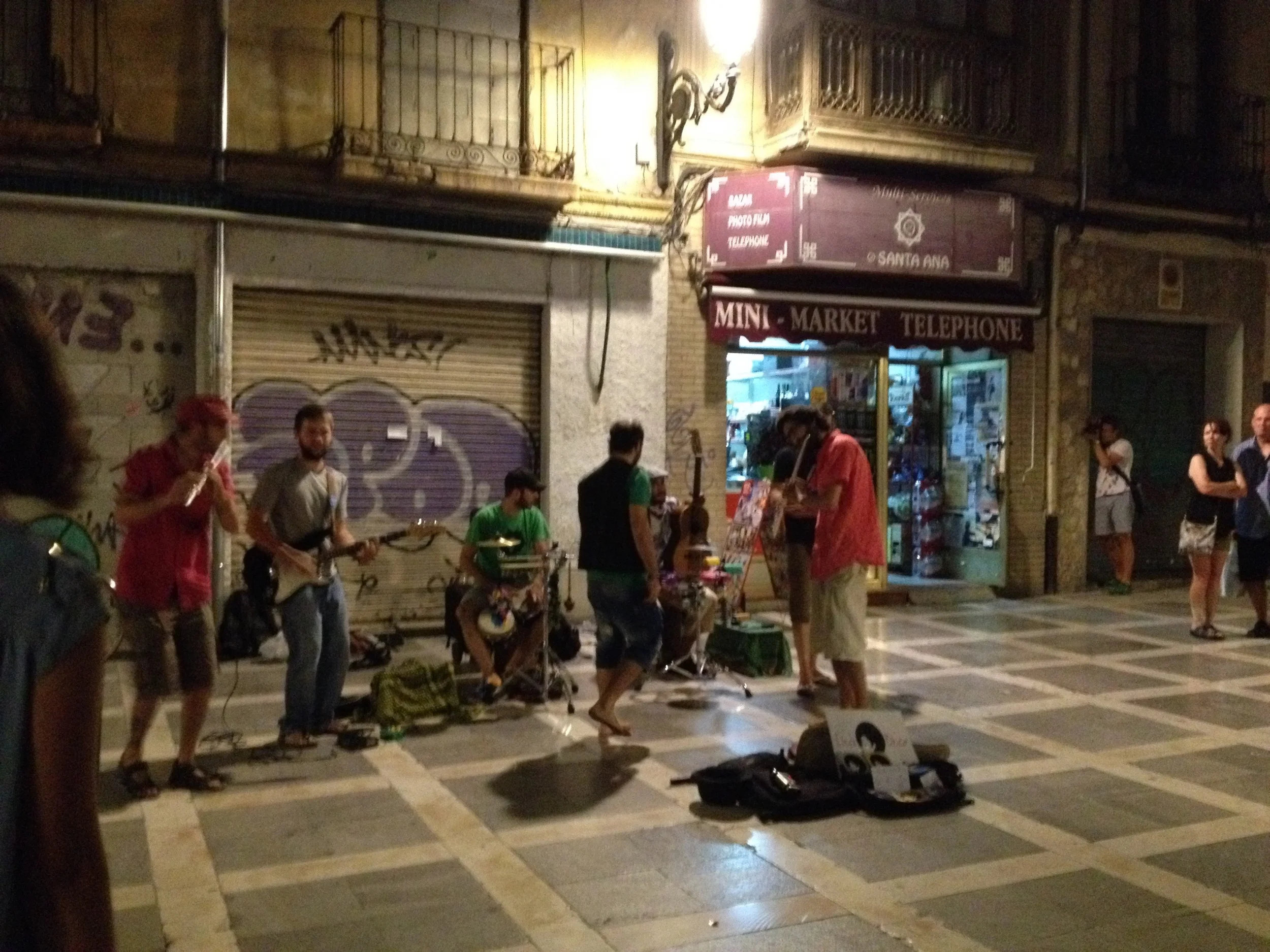 Street musicians jamming in Plaza Nueva, a fairly normal sight during Granada's warmer months.